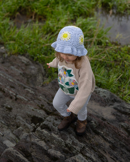 Le chapeau fleuronné - les petits