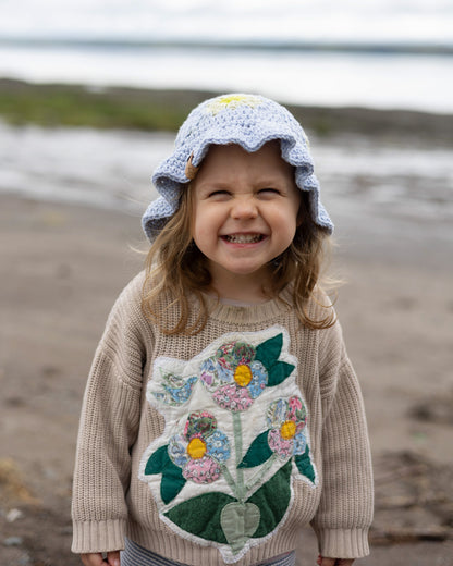 Le chapeau fleuronné - les petits